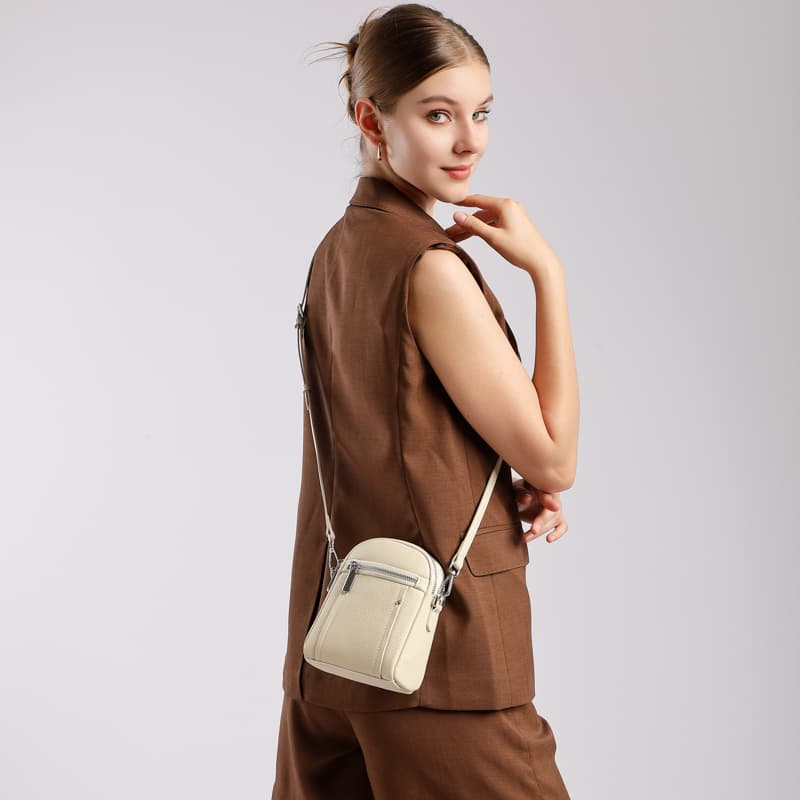 Women's Off White Togo Leather Zipper Mini Bags - Image 2