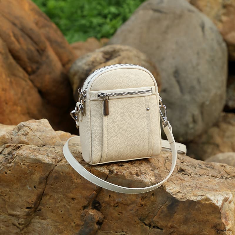 Women's Off White Togo Leather Zipper Mini Bags - Image 4